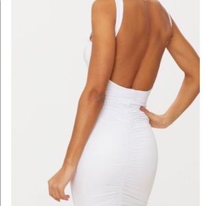 PrettyLittleThing ruched open back slinky dress.
